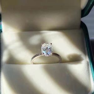 14k gold 2c oval moissanite ring side diamond